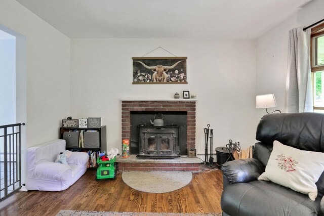 33 Greentree Dr N, Hyde Park, NY 12538 - living area featuring wood finished floors and a wood stove