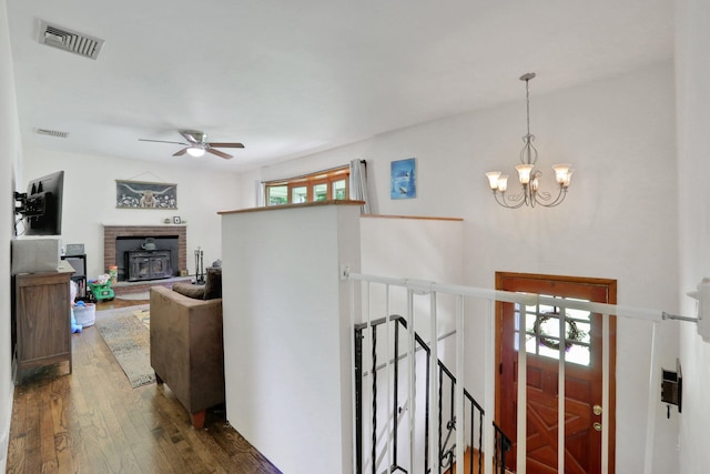 33 Greentree Dr N, Hyde Park, NY 12538 - corridor with wood finished floors, a chandelier, and an upstairs landing