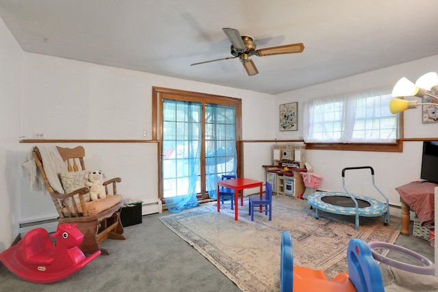 33 Greentree Dr N, Hyde Park, NY 12538 - rec room featuring plenty of natural light, a ceiling fan, carpet flooring, and a baseboard radiator