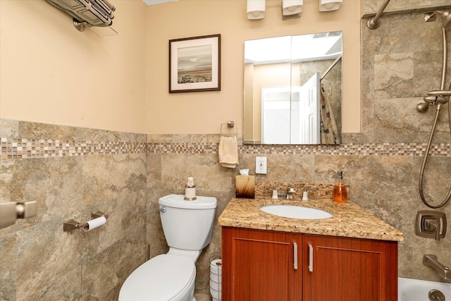 333 E Broadway Unit 1D, Long Beach, NY 11561 - full bath with vanity, toilet, washtub / shower combination, and tile walls
