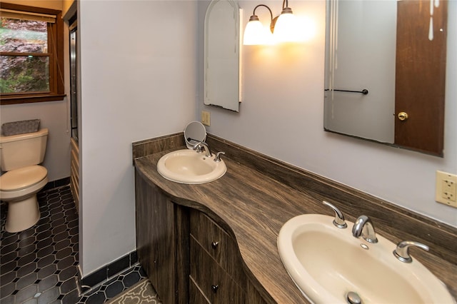 26 Stacey Dr, Monticello, NY 12701 - bathroom featuring double vanity and toilet