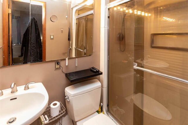 26 Stacey Dr, Monticello, NY 12701 - full bath with a sink, toilet, and a shower stall