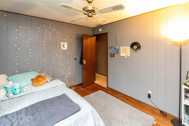 26 Stacey Dr, Monticello, NY 12701 - bedroom featuring wood finished floors and a ceiling fan