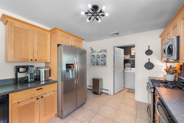 65 Awosting Rd, Pine Bush, NY 12566 - kitchen with stainless steel appliances, light brown cabinetry, dark countertops, washer / dryer, and wine cooler
