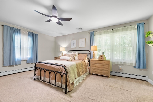 65 Awosting Rd, Pine Bush, NY 12566 - bedroom with baseboard heating, carpet, and ceiling fan