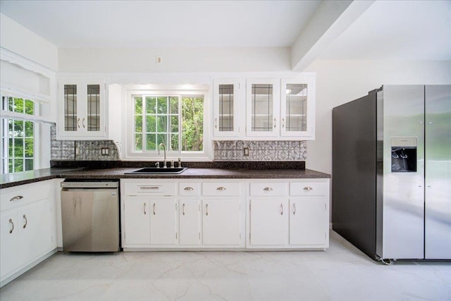 665 State Route 94 N, Warwick, NY 10990 - kitchen featuring appliances with stainless steel finishes, a sink, healthy amount of natural light, and backsplash