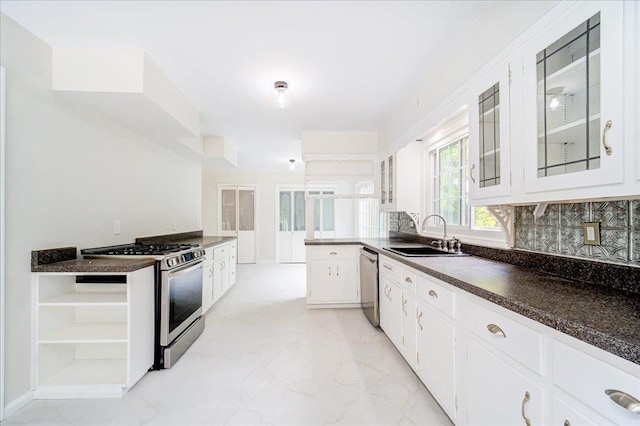 665 State Route 94 N, Warwick, NY 10990 - kitchen featuring appliances with stainless steel finishes, a sink, open shelves, and dark countertops
