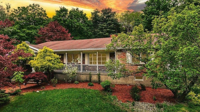 665 State Route 94 N, Warwick, NY 10990 - view of front facade featuring a porch and a lawn
