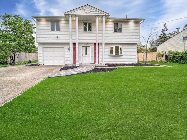 19 Leaf Ave, Central Islip, NY 11722 - view of front facade featuring driveway and an attached garage