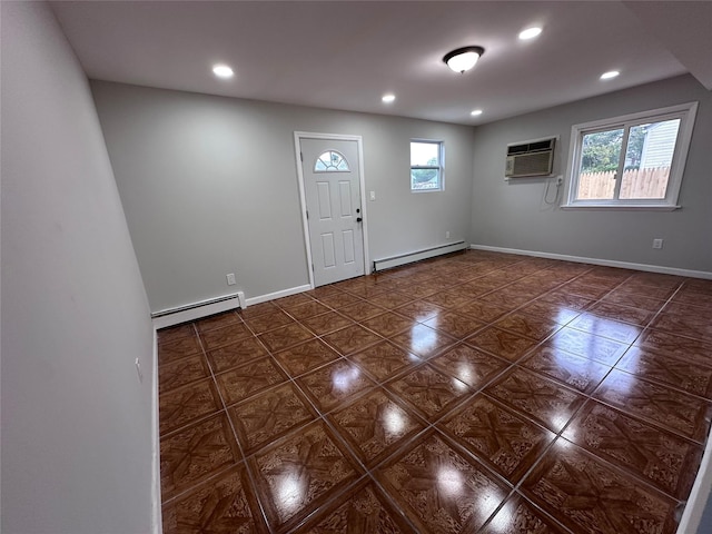 19 Leaf Ave, Central Islip, NY 11722 - entryway featuring a baseboard heating unit, an AC wall unit, recessed lighting, baseboards, and tile patterned floors