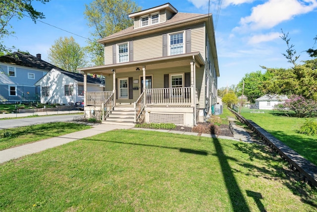 203 Highland Ave, Middletown, NY 10940 - traditional style home with covered porch and a front lawn