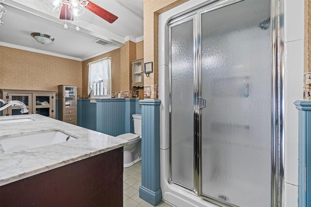 203 Highland Ave, Middletown, NY 10940 - full bathroom featuring wallpapered walls, toilet, double vanity, ceiling fan, and a stall shower