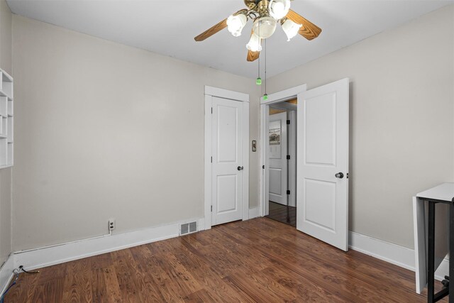 203 Highland Ave, Middletown, NY 10940 - unfurnished bedroom with wood finished floors, baseboards, and a ceiling fan