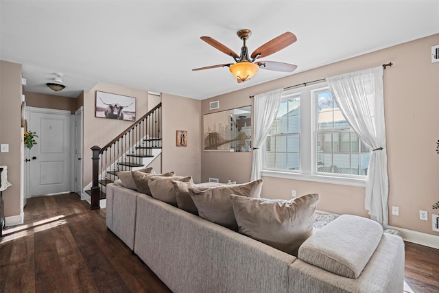 203 Highland Ave, Middletown, NY 10940 - living area with dark wood-type flooring, stairway, baseboards, and ceiling fan
