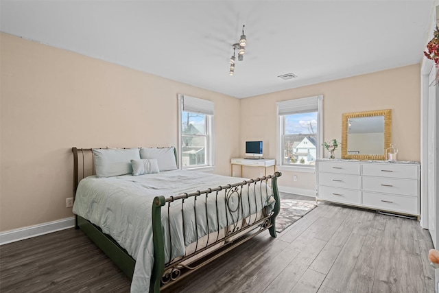 203 Highland Ave, Middletown, NY 10940 - bedroom featuring wood finished floors, baseboards, and multiple windows