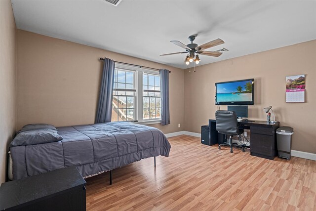 203 Highland Ave, Middletown, NY 10940 - bedroom featuring baseboards, wood finished floors, and a ceiling fan