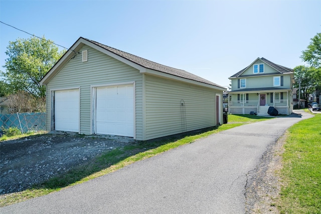 203 Highland Ave, Middletown, NY 10940 - view of front facade with an outdoor structure and a detached garage