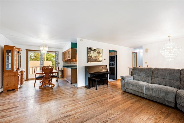 184 Mt Prosper Rd, Wurtsboro, NY 12790 - living area with a chandelier and light wood-type flooring