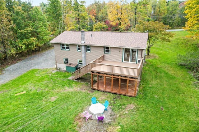 184 Mt Prosper Rd, Wurtsboro, NY 12790 - rear view of house featuring stairs, a wooden deck, a shingled roof, and a lawn