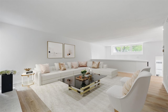 348 Heritage Hls Unit A, Somers, NY 10589 - living area featuring light wood-style flooring and baseboards