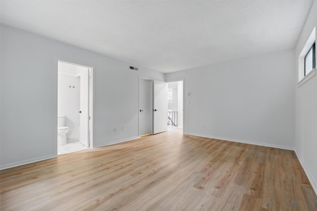 348 Heritage Hls Unit A, Somers, NY 10589 - spare room with light wood-type flooring and baseboards