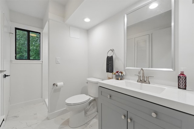 348 Heritage Hls Unit A, Somers, NY 10589 - bathroom featuring marble look tiles, vanity, and recessed lighting