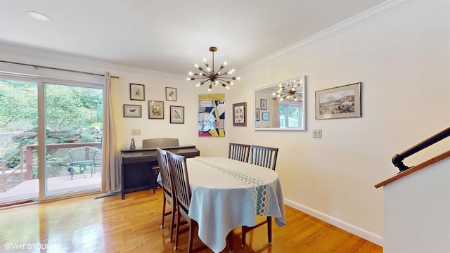 50 Snowden Ave, Ossining, NY 10562 - dining area with a chandelier, light wood-style flooring, ornamental molding, and baseboards