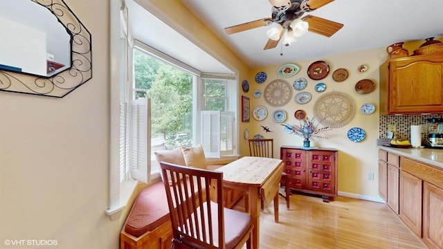 50 Snowden Ave, Ossining, NY 10562 - dining room with light wood-style floors, ceiling fan, and baseboards