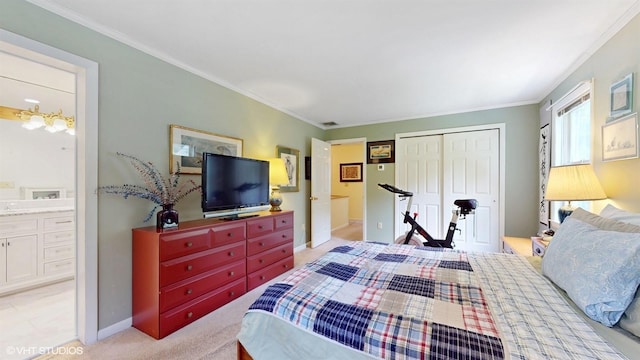 50 Snowden Ave, Ossining, NY 10562 - bedroom featuring baseboards, crown molding, a closet, ensuite bathroom, and light carpet