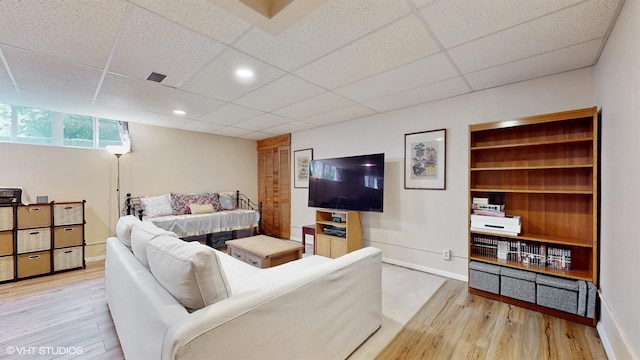 50 Snowden Ave, Ossining, NY 10562 - living room with wood finished floors, baseboards, and a paneled ceiling