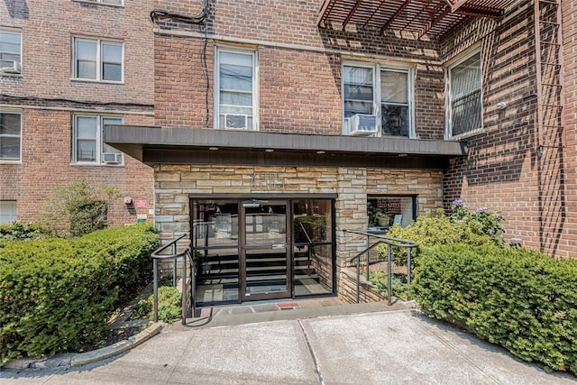 4265 Webster Ave Unit 3H, Bronx, NY 10470 - view of exterior entry featuring brick siding and stone siding