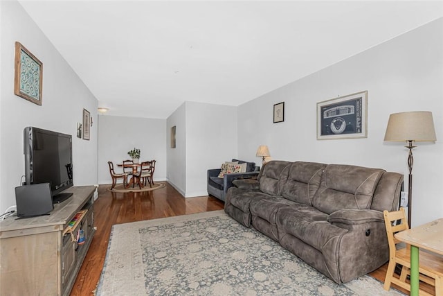 4265 Webster Ave Unit 3H, Bronx, NY 10470 - living area with dark wood-type flooring and baseboards