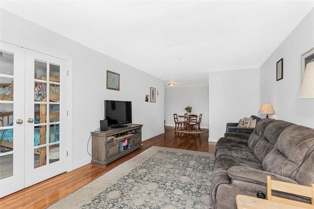 4265 Webster Ave Unit 3H, Bronx, NY 10470 - living area with wood finished floors, french doors, and baseboards