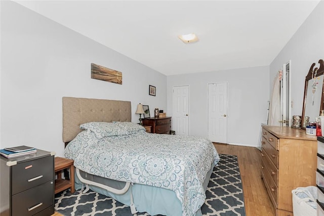 4265 Webster Ave Unit 3H, Bronx, NY 10470 - bedroom featuring wood finished floors, multiple closets, and baseboards