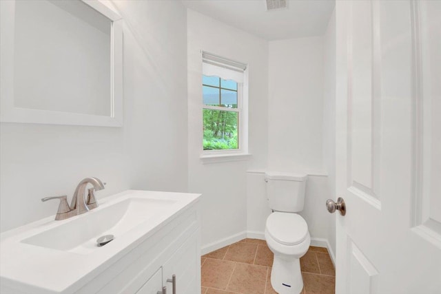 145 Underhill Ln Unit 145, Peekskill, NY 10566 - bathroom with toilet, vanity, baseboards, and tile patterned floors