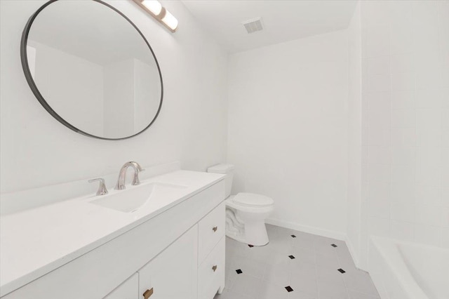 145 Underhill Ln Unit 145, Peekskill, NY 10566 - bathroom with vanity, tile patterned floors, toilet, and baseboards