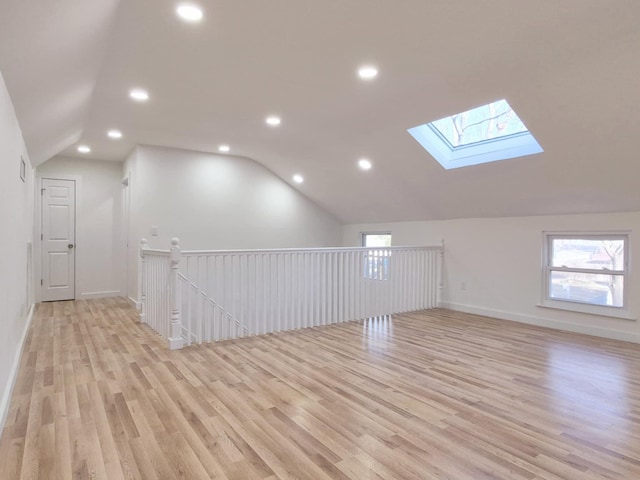 52 Nottingham Dr, Middle Island, NY 11953 - bonus room featuring vaulted ceiling, a skylight, light wood-type flooring, healthy amount of natural light, and recessed lighting