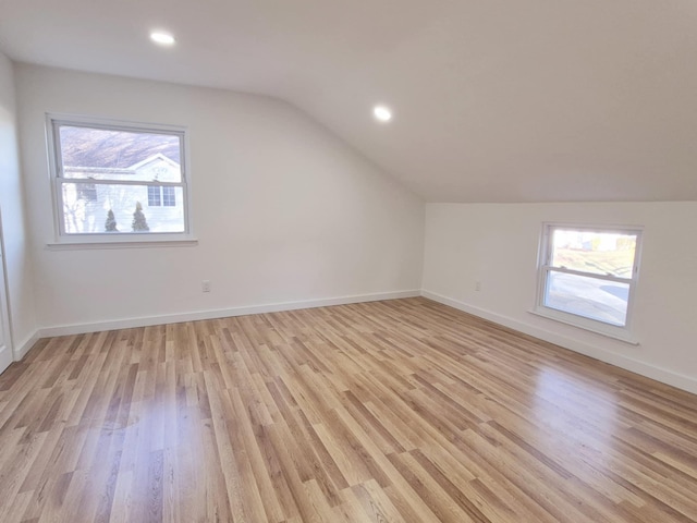 52 Nottingham Dr, Middle Island, NY 11953 - bonus room with vaulted ceiling, light wood-style flooring, healthy amount of natural light, baseboards, and recessed lighting