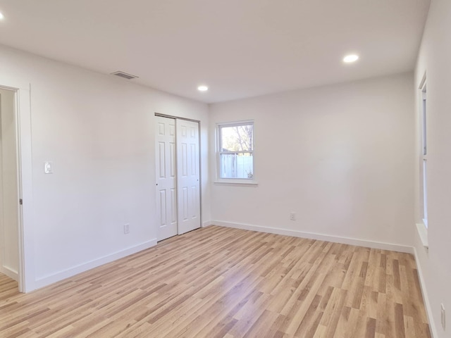 52 Nottingham Dr, Middle Island, NY 11953 - empty room with light wood-style floors, recessed lighting, and baseboards