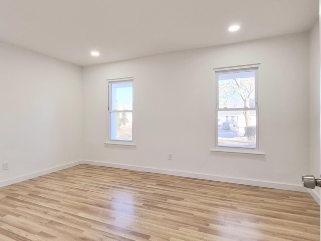 52 Nottingham Dr, Middle Island, NY 11953 - empty room with healthy amount of natural light, light wood-style flooring, baseboards, and recessed lighting