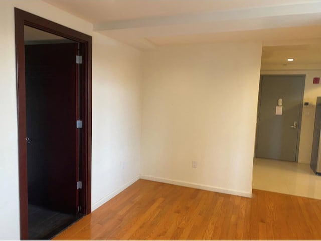 86 Canal St, New York Manhattan, NY 10002 - empty room with light wood-type flooring, baseboards, and recessed lighting