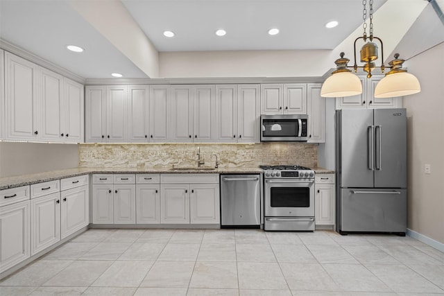 6 Chippewa Ct, Suffern, NY 10901 - kitchen with appliances with stainless steel finishes, a sink, decorative backsplash, a chandelier, and recessed lighting