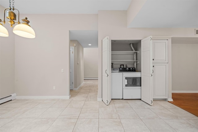 6 Chippewa Ct, Suffern, NY 10901 - kitchen with washer and dryer, a baseboard heating unit, white cabinetry, baseboards, and recessed lighting
