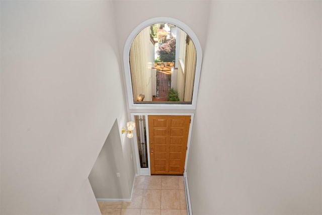 6 Chippewa Ct, Suffern, NY 10901 - doorway to outside with light tile patterned flooring and baseboards