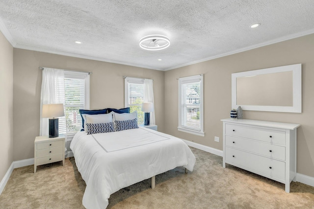 312 5th Ave, Greenport, NY 11944 - bedroom with crown molding, baseboards, light colored carpet, a textured ceiling, and recessed lighting