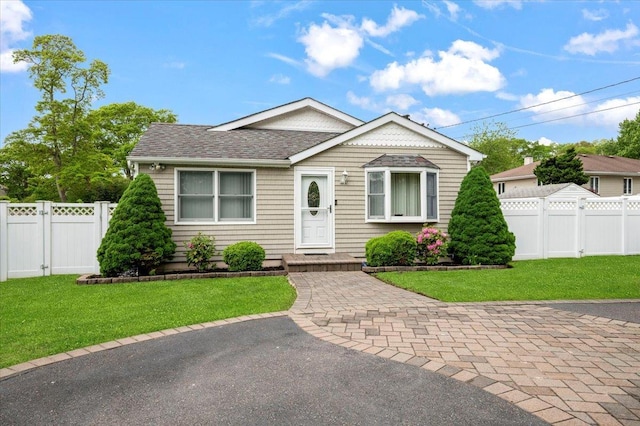 12 Midwood Pl, Farmingville, NY 11738 - view of front of house with a shingled roof