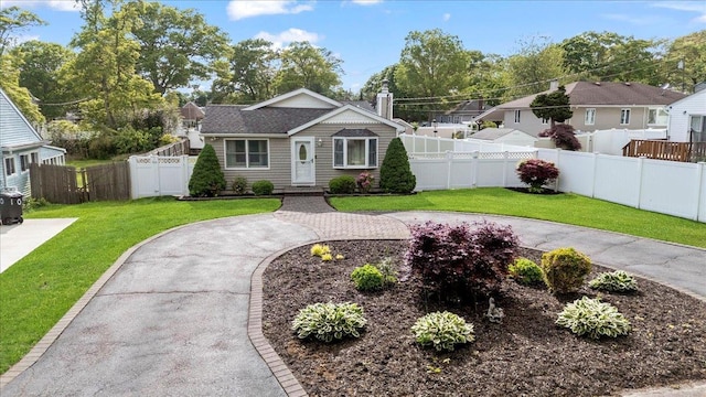 12 Midwood Pl, Farmingville, NY 11738 - view of front of house with curved driveway and a chimney