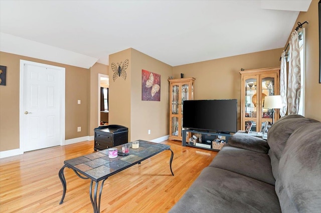 12 Midwood Pl, Farmingville, NY 11738 - living area with light wood finished floors and baseboards