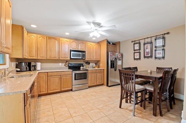 12 Midwood Pl, Farmingville, NY 11738 - kitchen with stainless steel appliances, a sink, light brown cabinets, recessed lighting, and ceiling fan