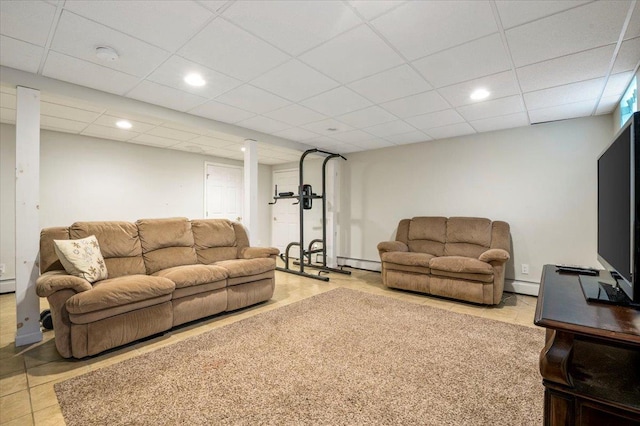 12 Midwood Pl, Farmingville, NY 11738 - living room with tile patterned floors, a baseboard heating unit, a drop ceiling, recessed lighting, and a baseboard radiator